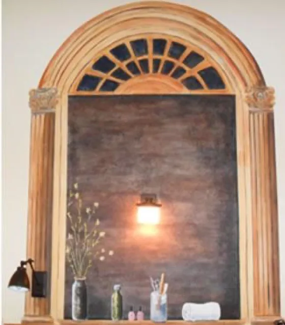 Decorative hand-painted mural accent inside the spa